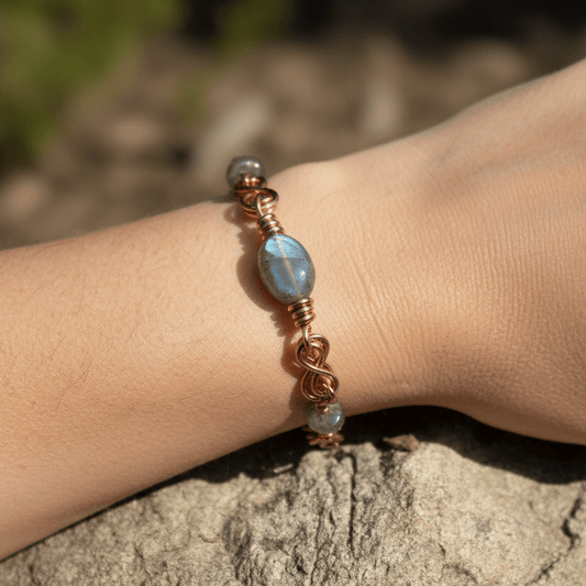copper double infinity wire wrapped bracelet in copper carrie foscato design