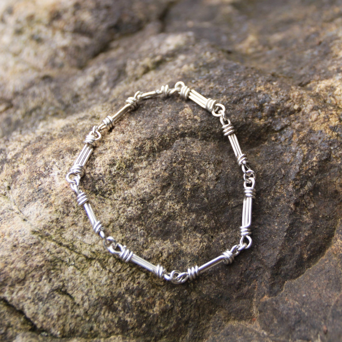 handmade sterling silver nautical link style chain link bracelet on wood carrie foscato design