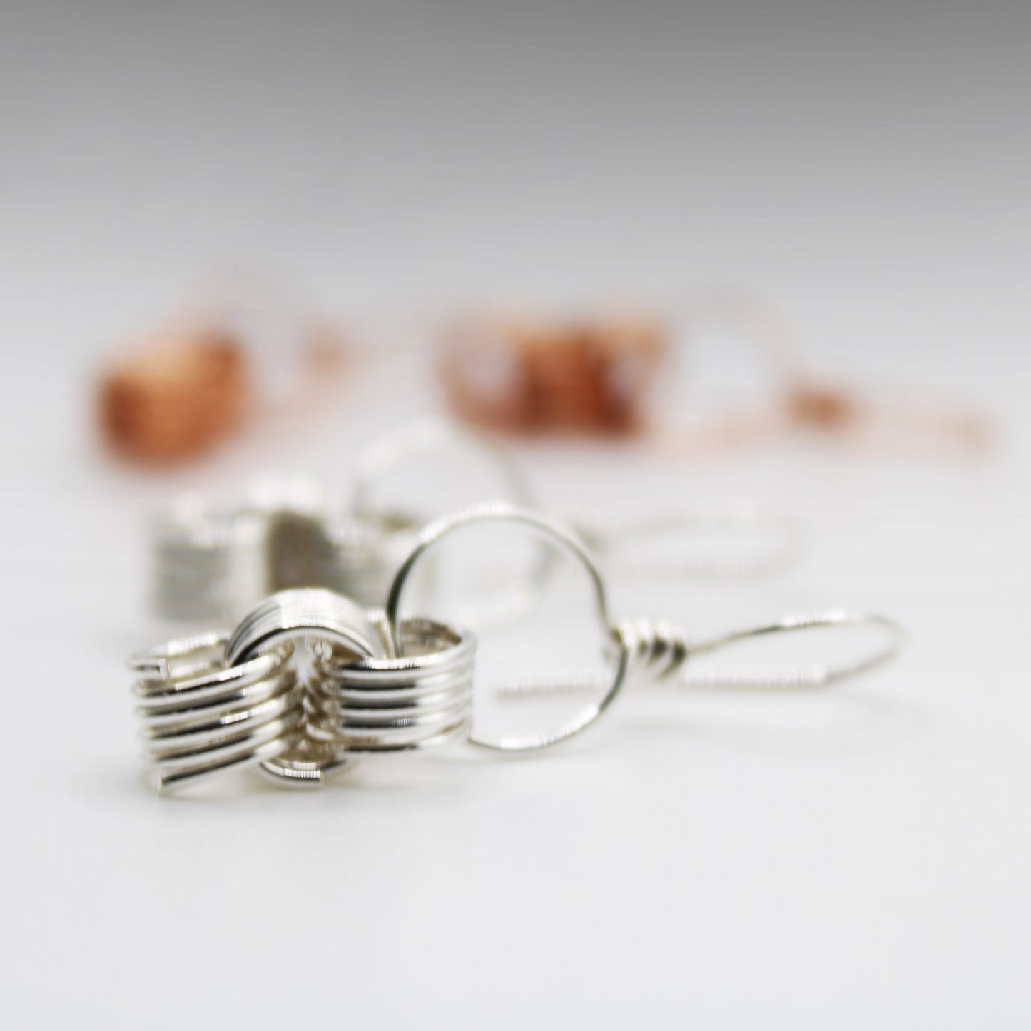 handmade wire wrapped sterling silver triple coiled dangle earrings with french wires