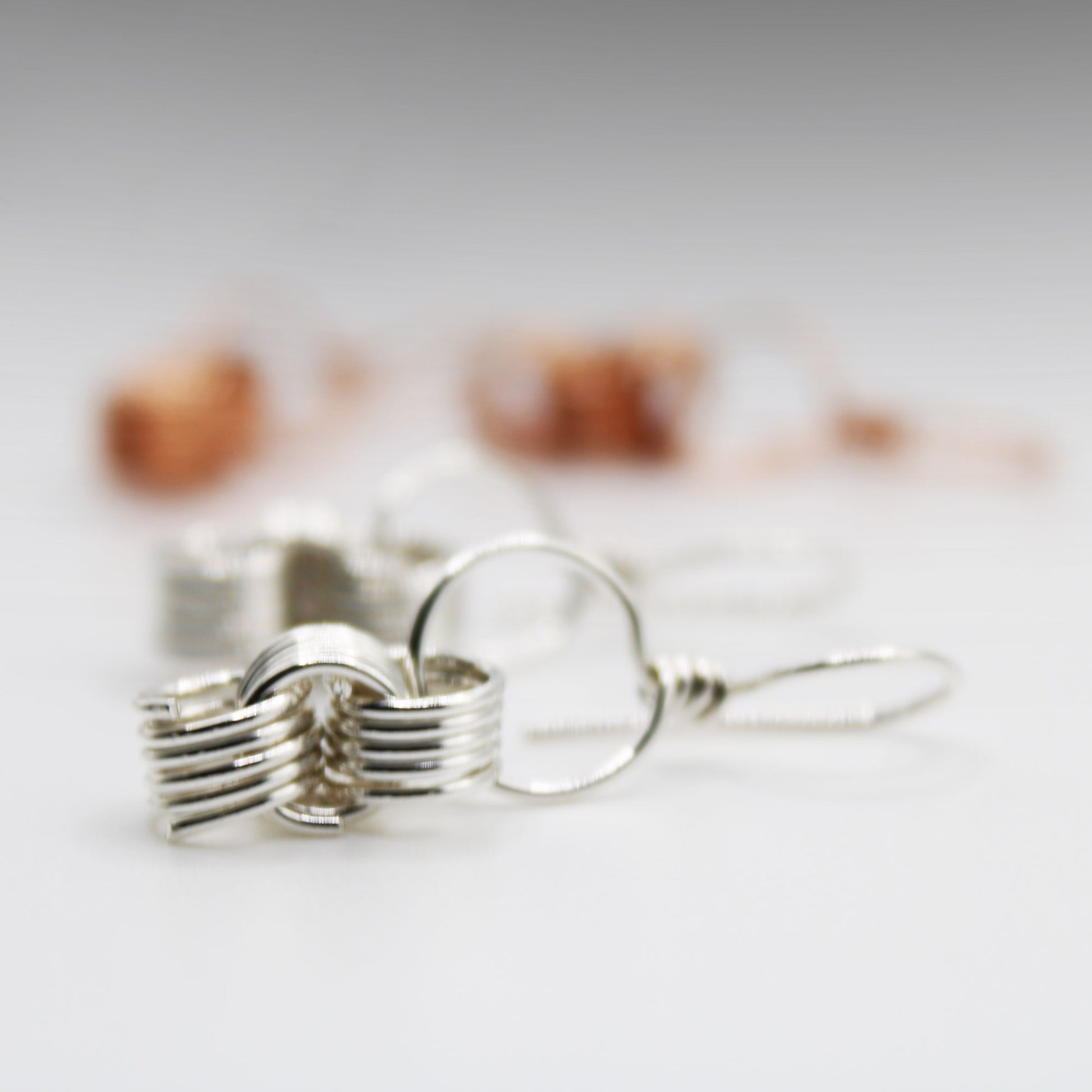 handmade wire wrapped sterling silver triple coiled dangle earrings with french wires