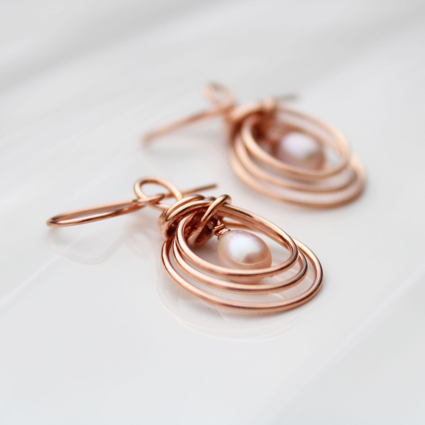pipa knot wire wrapped copper earrings with pearl teardrop handmade USA carrie foscato design
