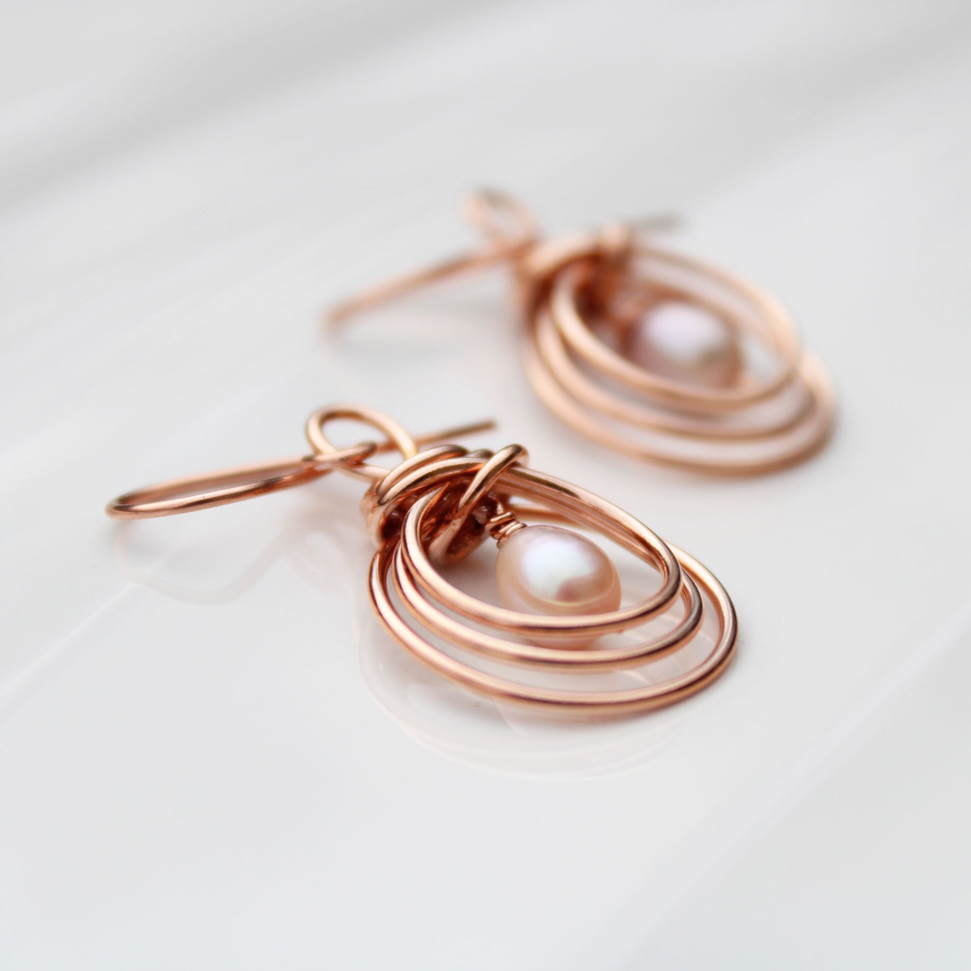pipa knot wire wrapped copper earrings with pearl teardrop handmade USA carrie foscato design