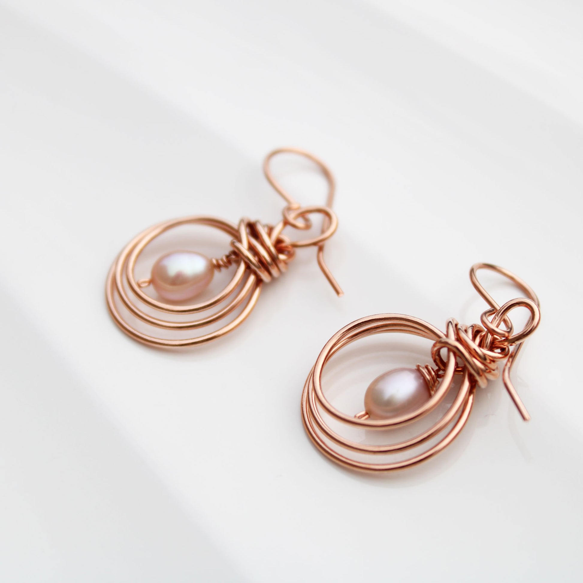 pipa knot wire wrapped copper earrings with pearl teardrop handmade USA carrie foscato design