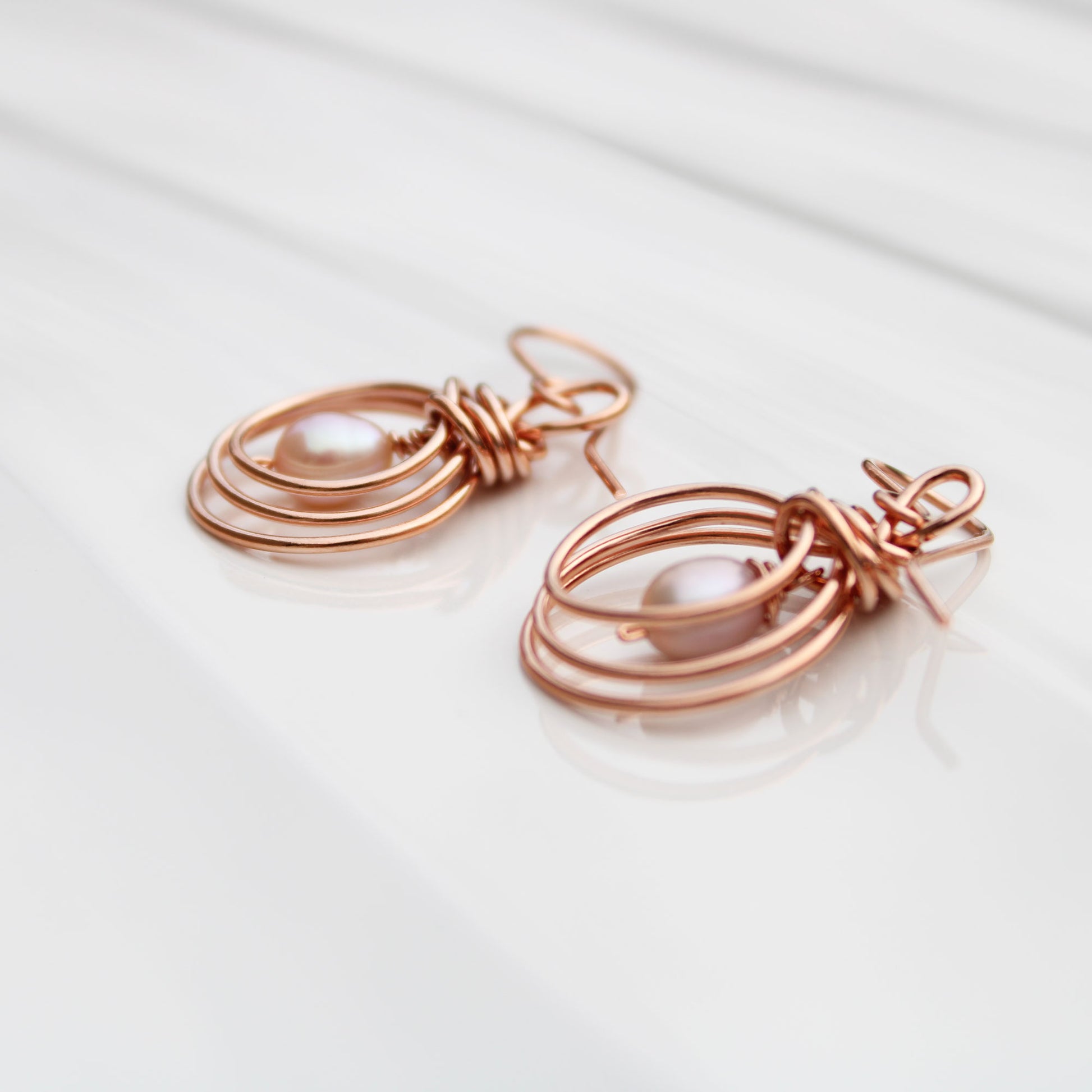 pipa knot wire wrapped copper earrings with pearl teardrop handmade USA carrie foscato design