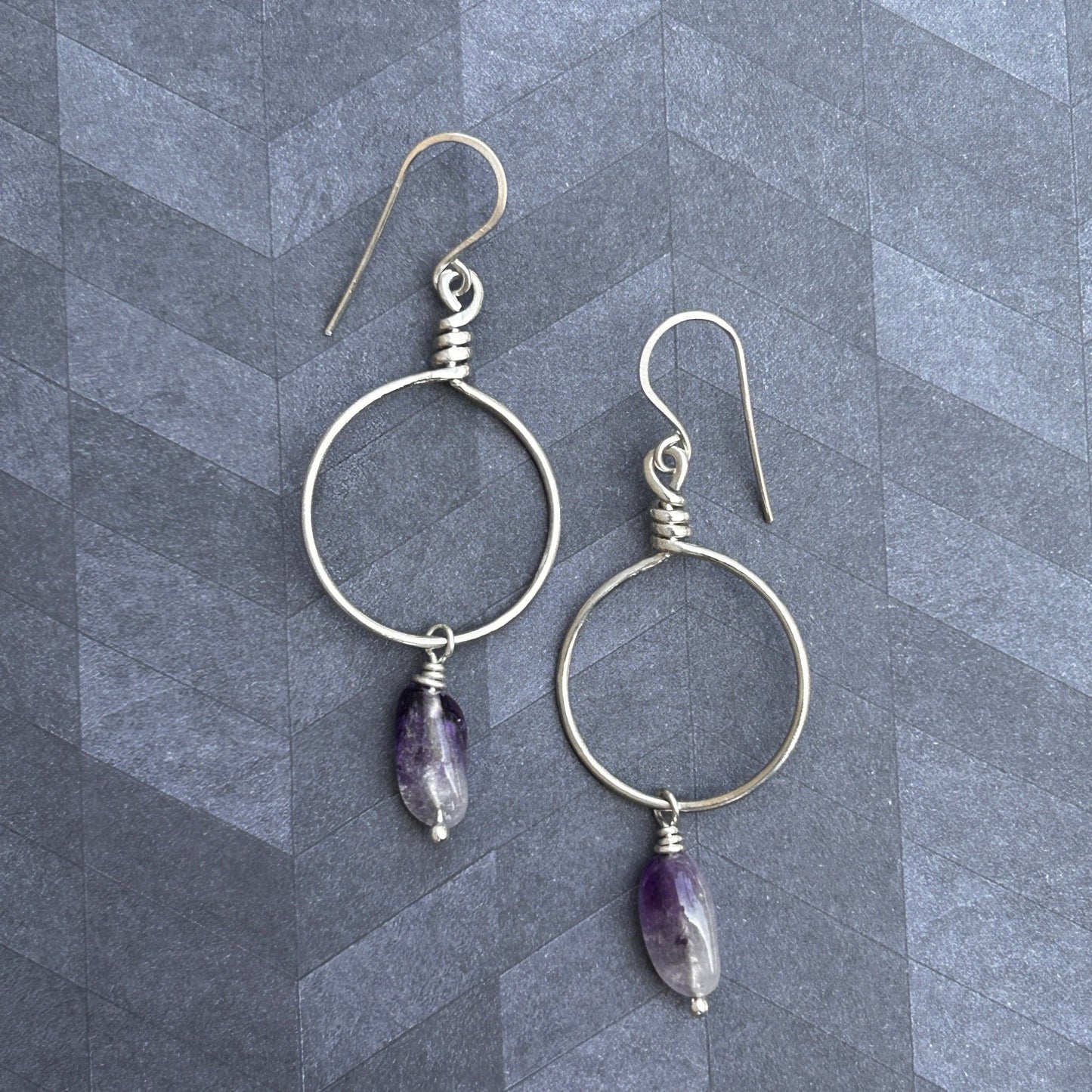 Wire wrapped hoop earrings in sterling silver with amethyst ombré drop gemstones