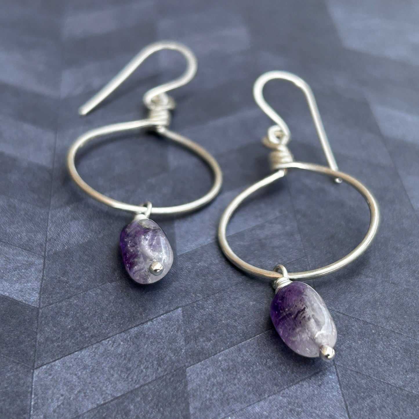 Wire wrapped hoop earrings in sterling silver with amethyst ombré drop gemstones