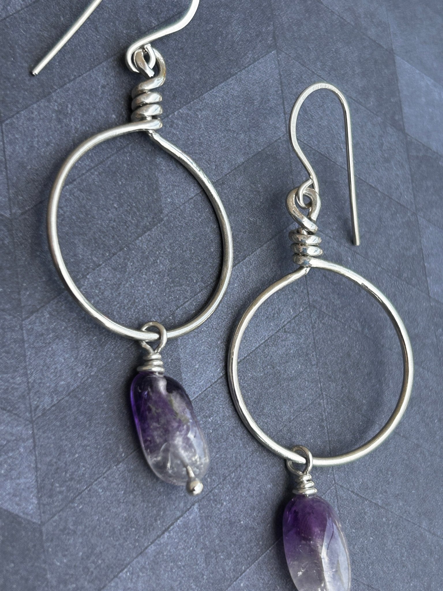 Wire wrapped hoop earrings in sterling silver with amethyst ombré drop gemstones
