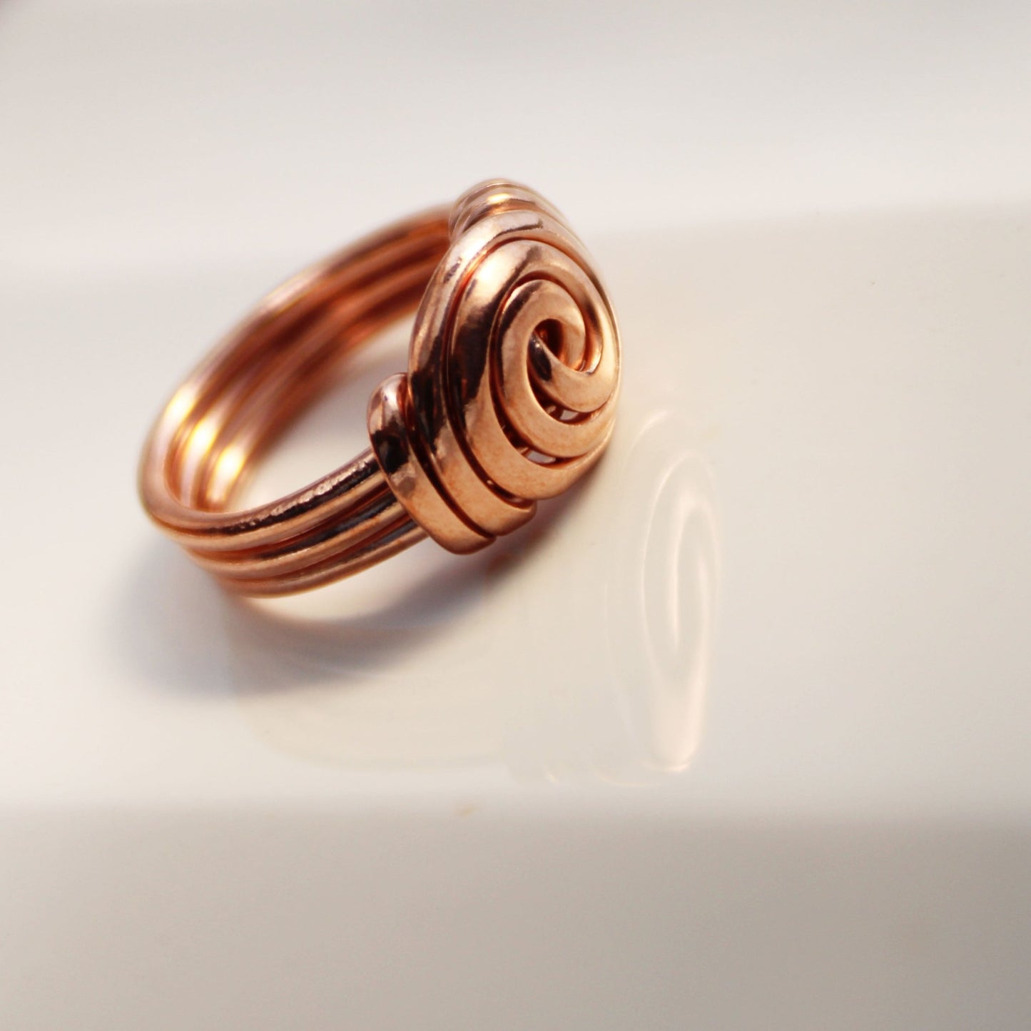 Weighted solid copper spiral ring with a smooth snag-free finish and comfortable fit