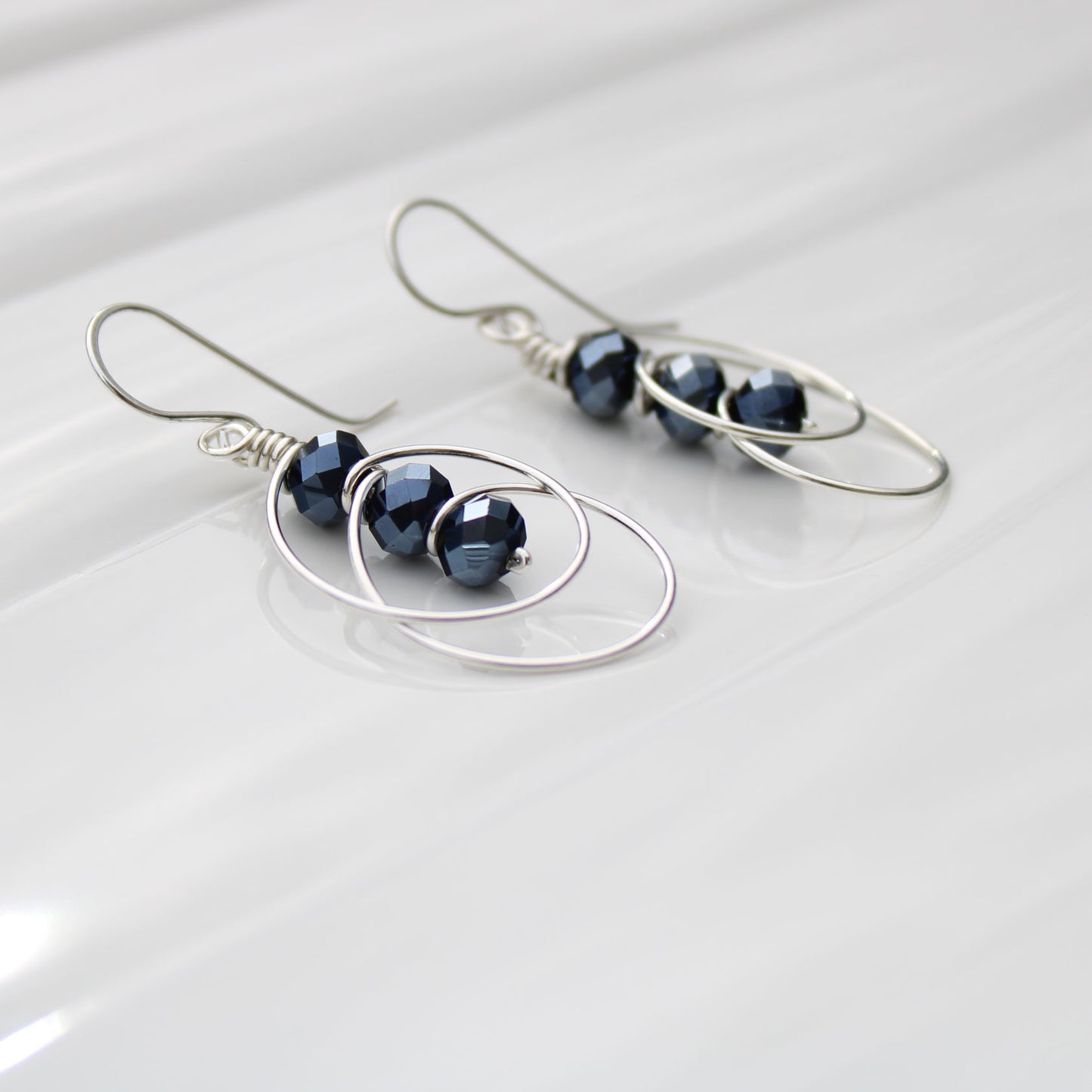 blueberry spinel sterling silver wire wrapped earrings handmade USA