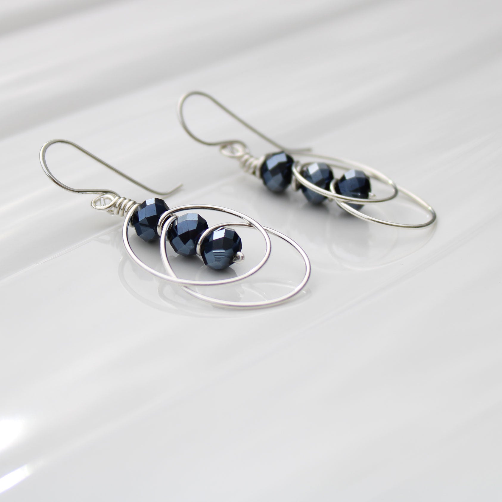 blueberry spinel sterling silver wire wrapped earrings handmade USA