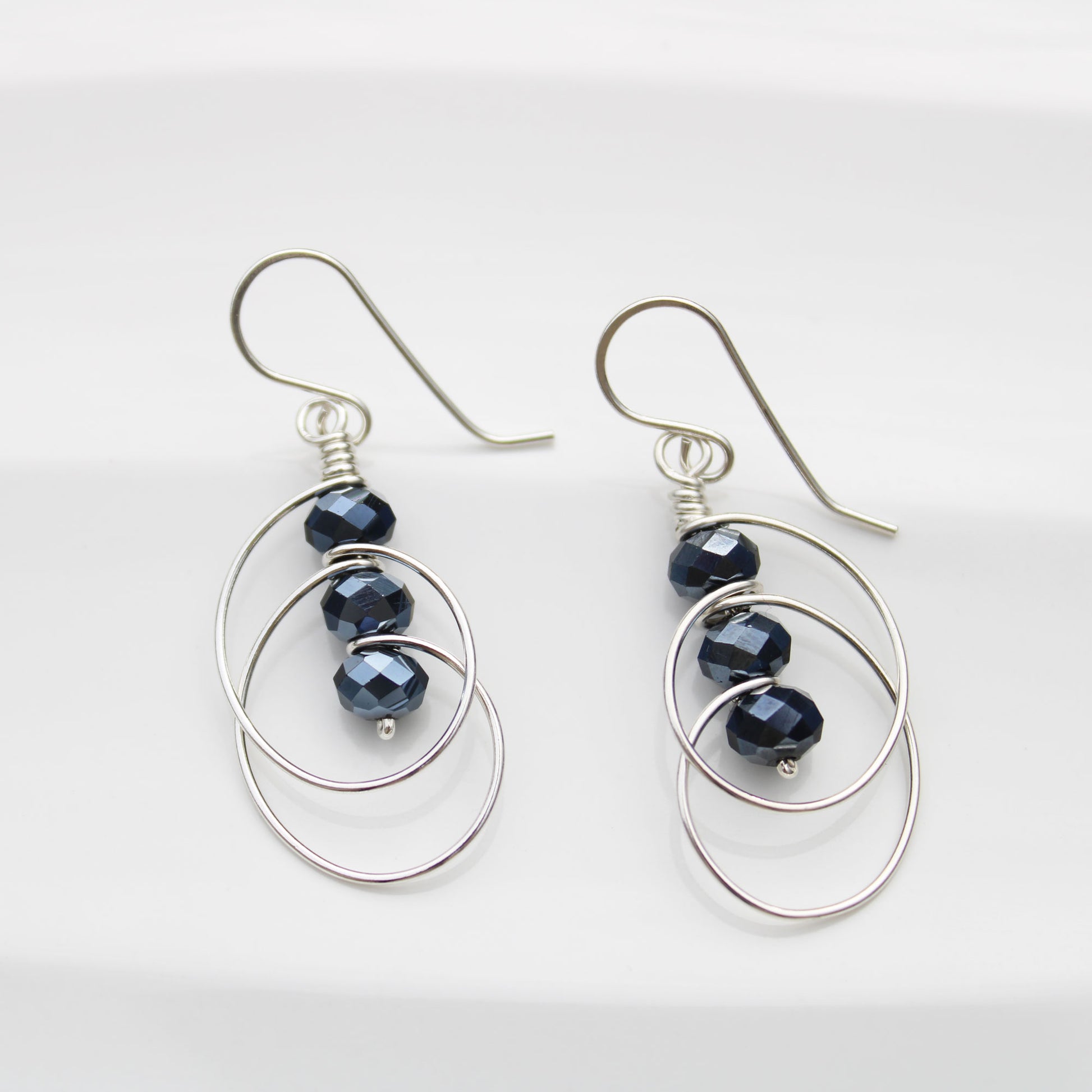 blueberry spinel sterling silver wire wrapped earrings handmade USA