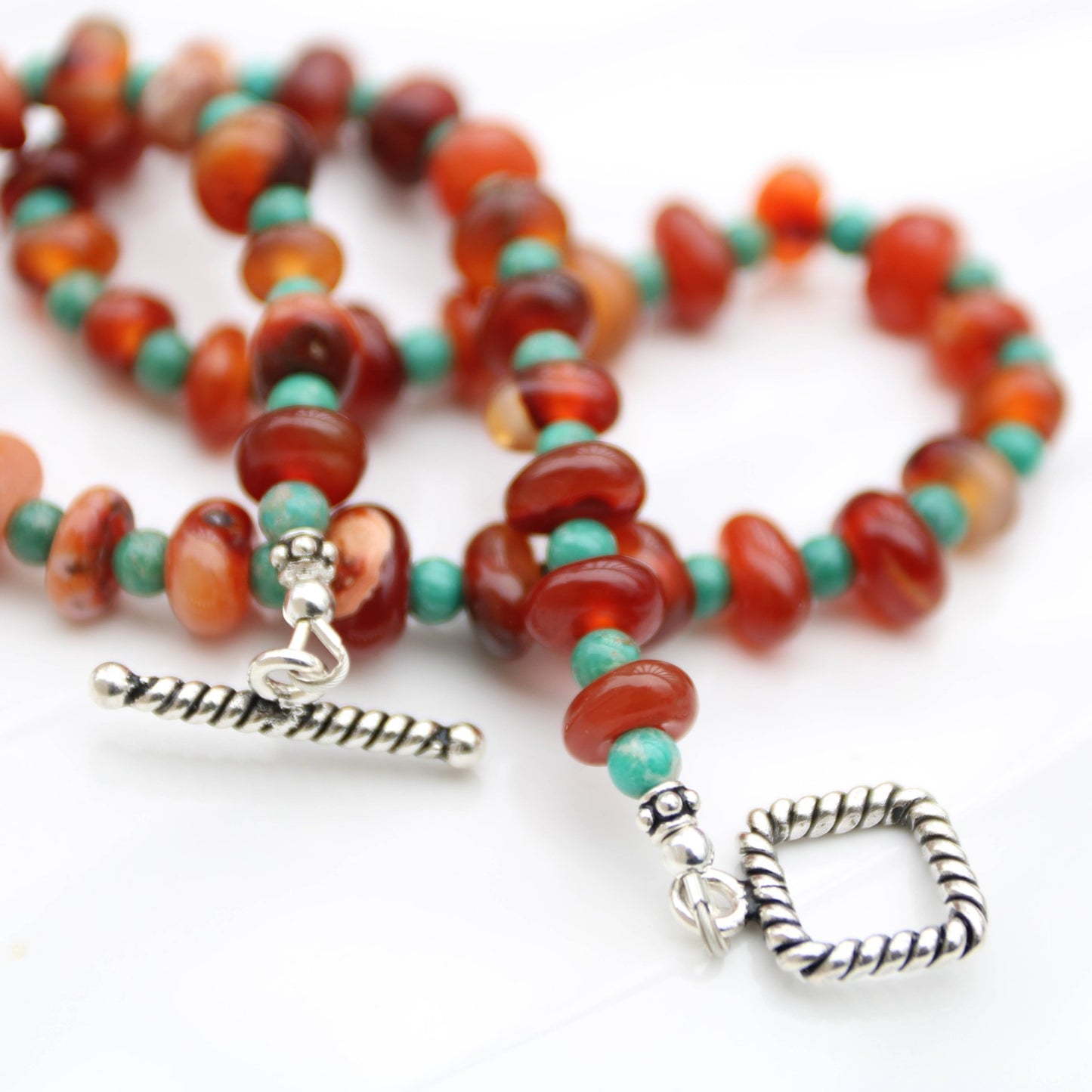 Botswana Red Agate Donut style beads accented with magnesite turquoise sterling toggle clasp handmade in virginia