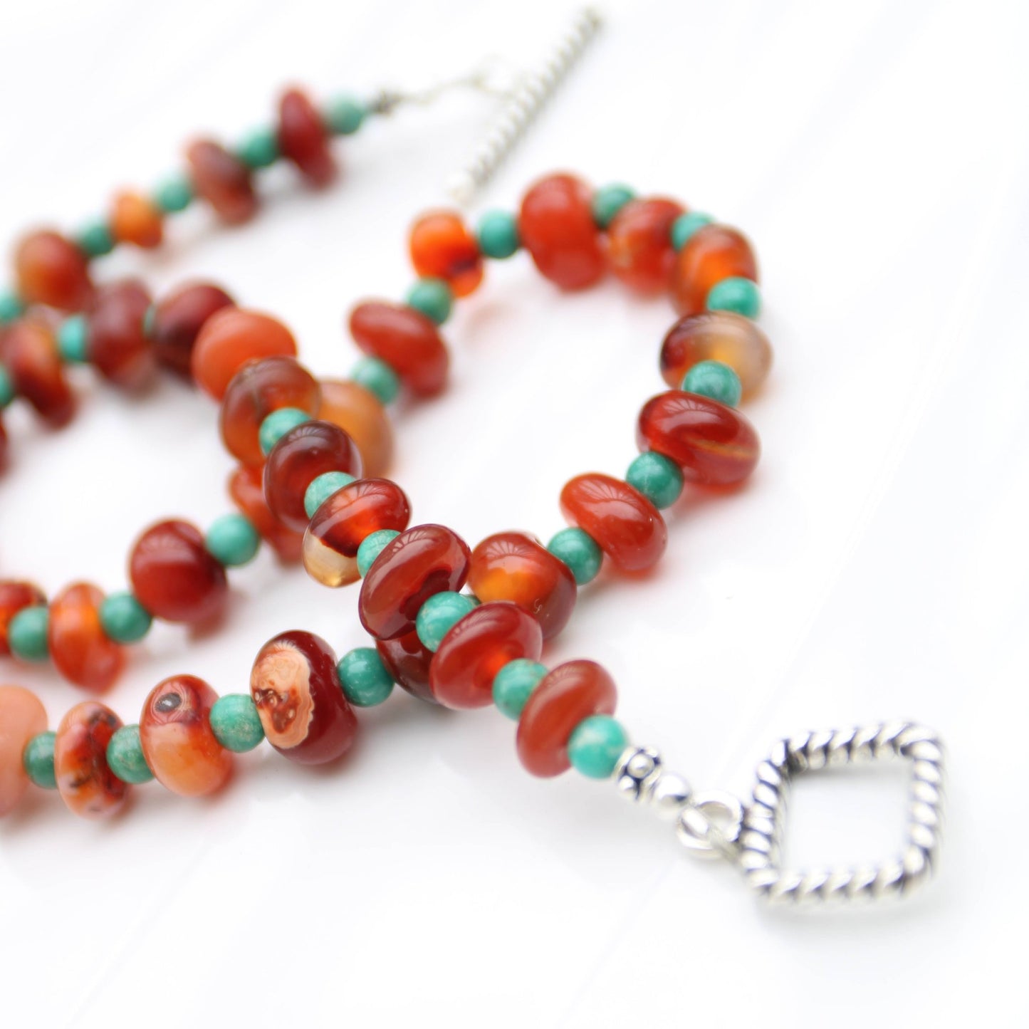 Botswana Red Agate Donut style beads accented with magnesite turquoise sterling toggle clasp handmade in virginia