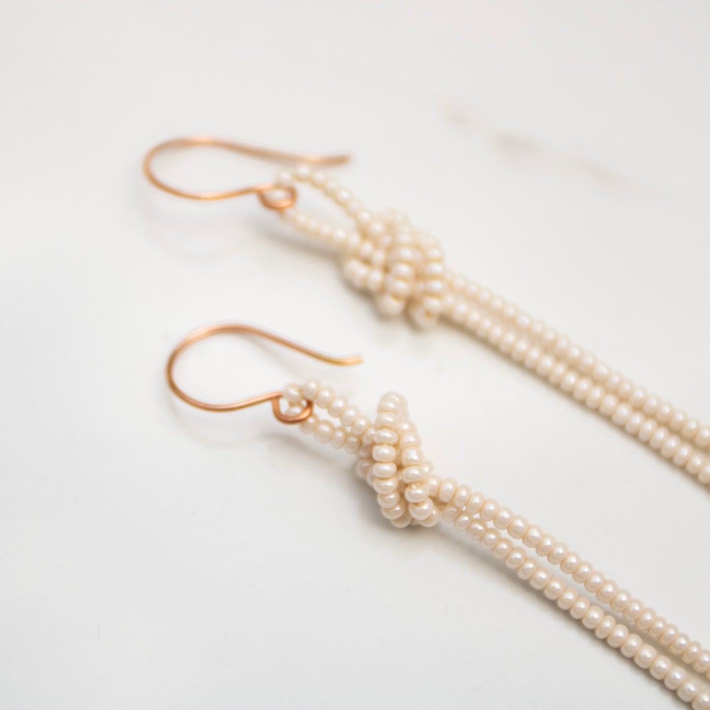 Tidal Knot — Ivory & Blush Pearl Fringe Earrings