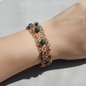 Copper Scroll Cuff Bracelet with Green Stones – Renaissance-Inspired Wearable Art