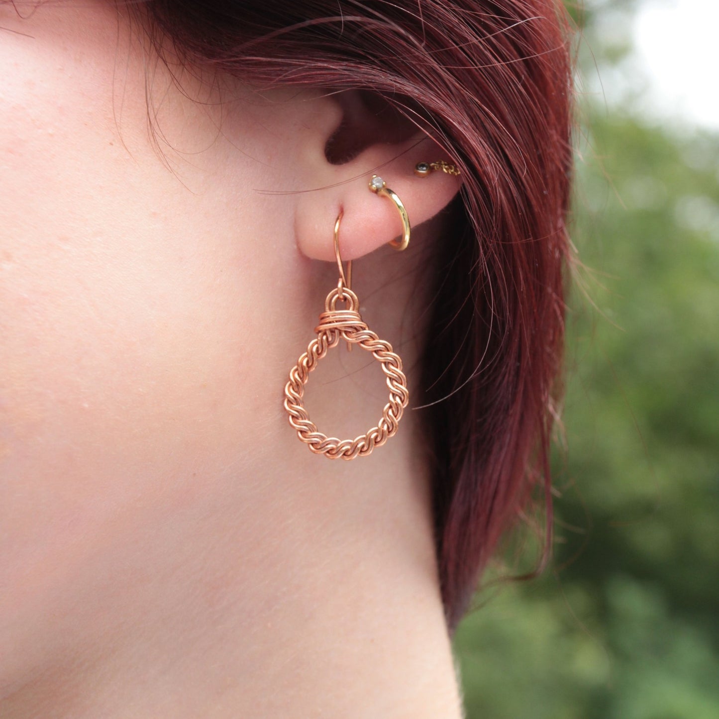hand twisted copper hoop earrings with handmade french ear wires carrie foscato design USA