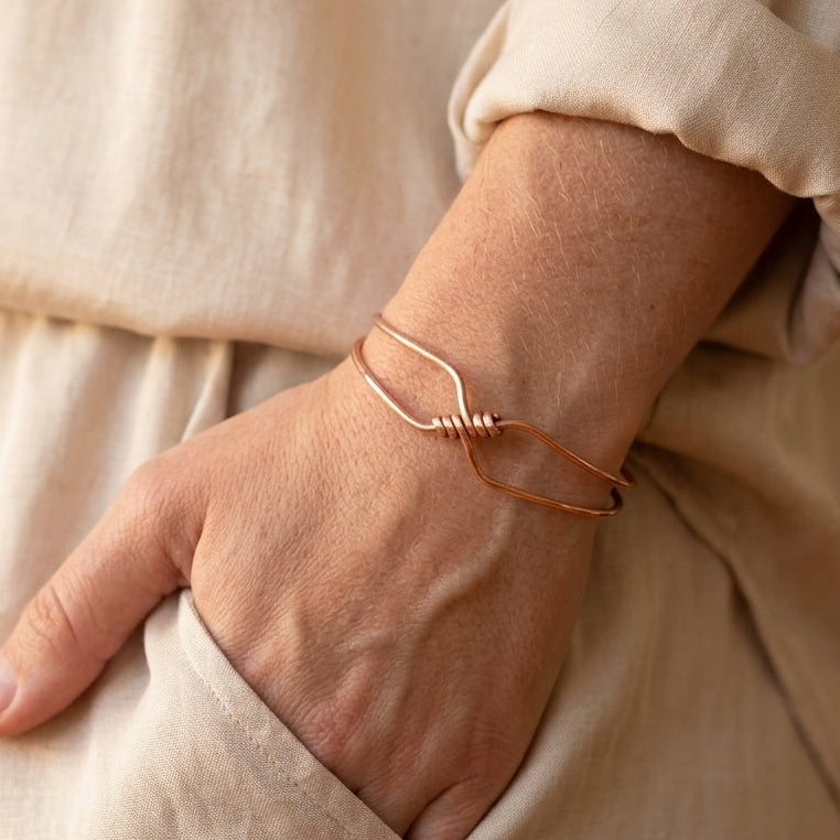handmade copper bangle bracelet with nautical wraps carrie foscato design