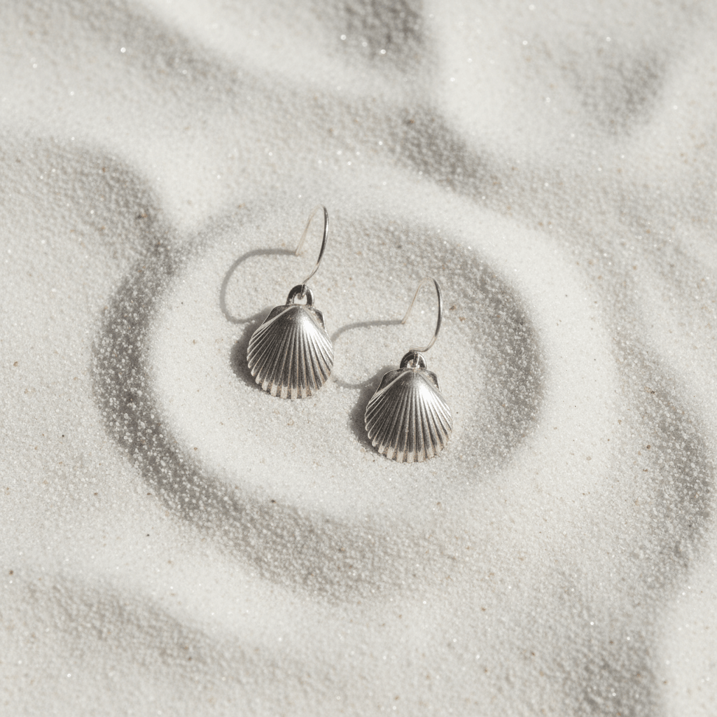 Fine Silver Shell Earrings Flat Lay on Sand
