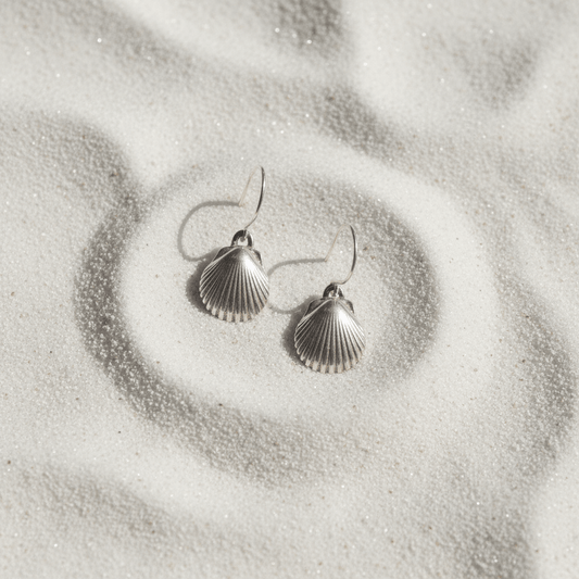 Fine Silver Shell Earrings Flat Lay on Sand