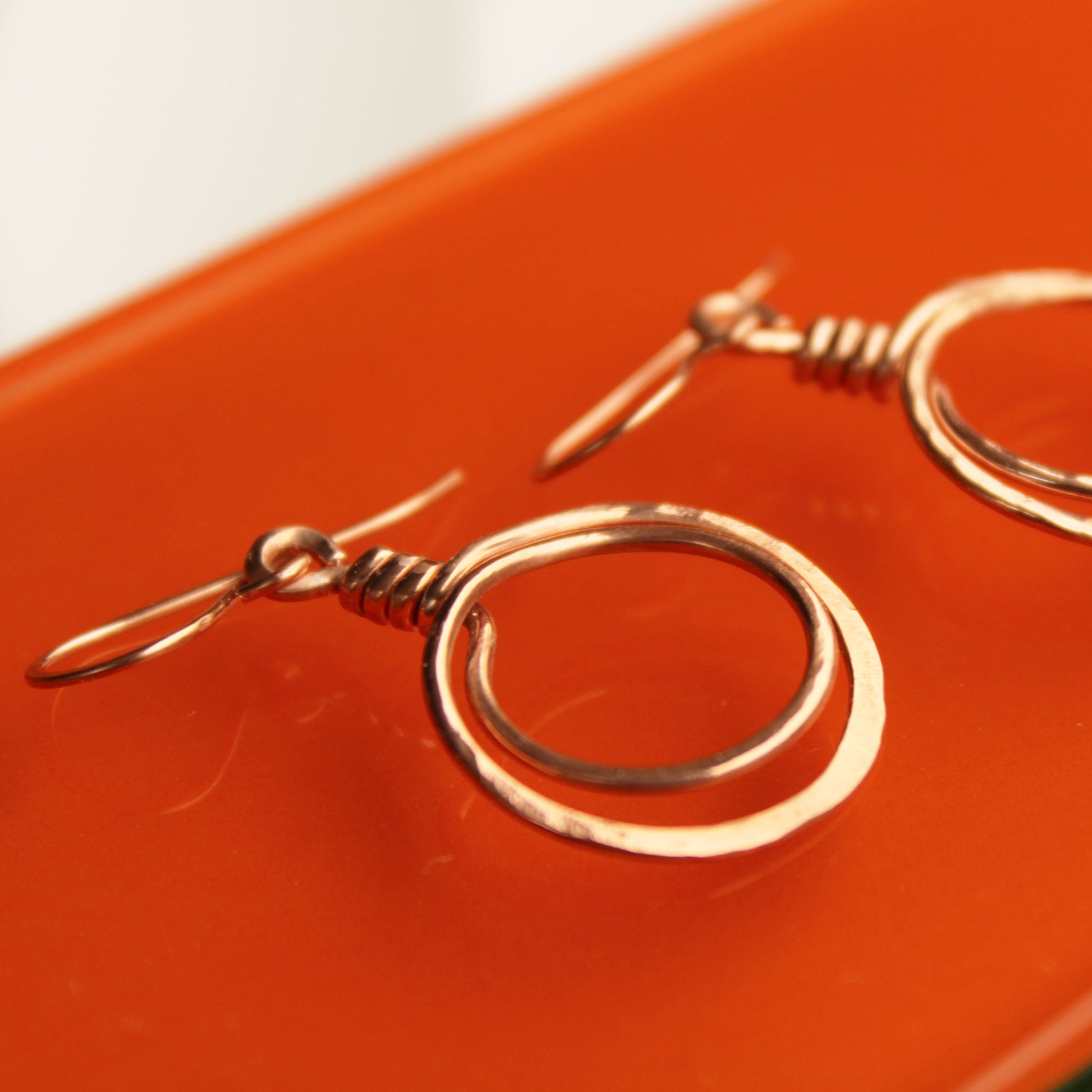 hammered artisanal bare copper double hoop loop earrings carrie foscato design