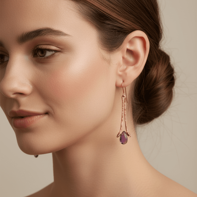 handmade hammered copper earrings dangle style with amethyst briolette gems. carrie foscato design USA