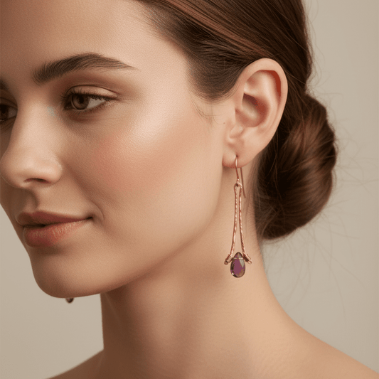 handmade hammered copper earrings dangle style with amethyst briolette gems. carrie foscato design USA