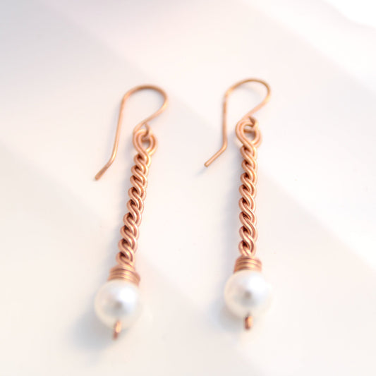 Handmade copper twist drop earrings with white freshwater pearl accents