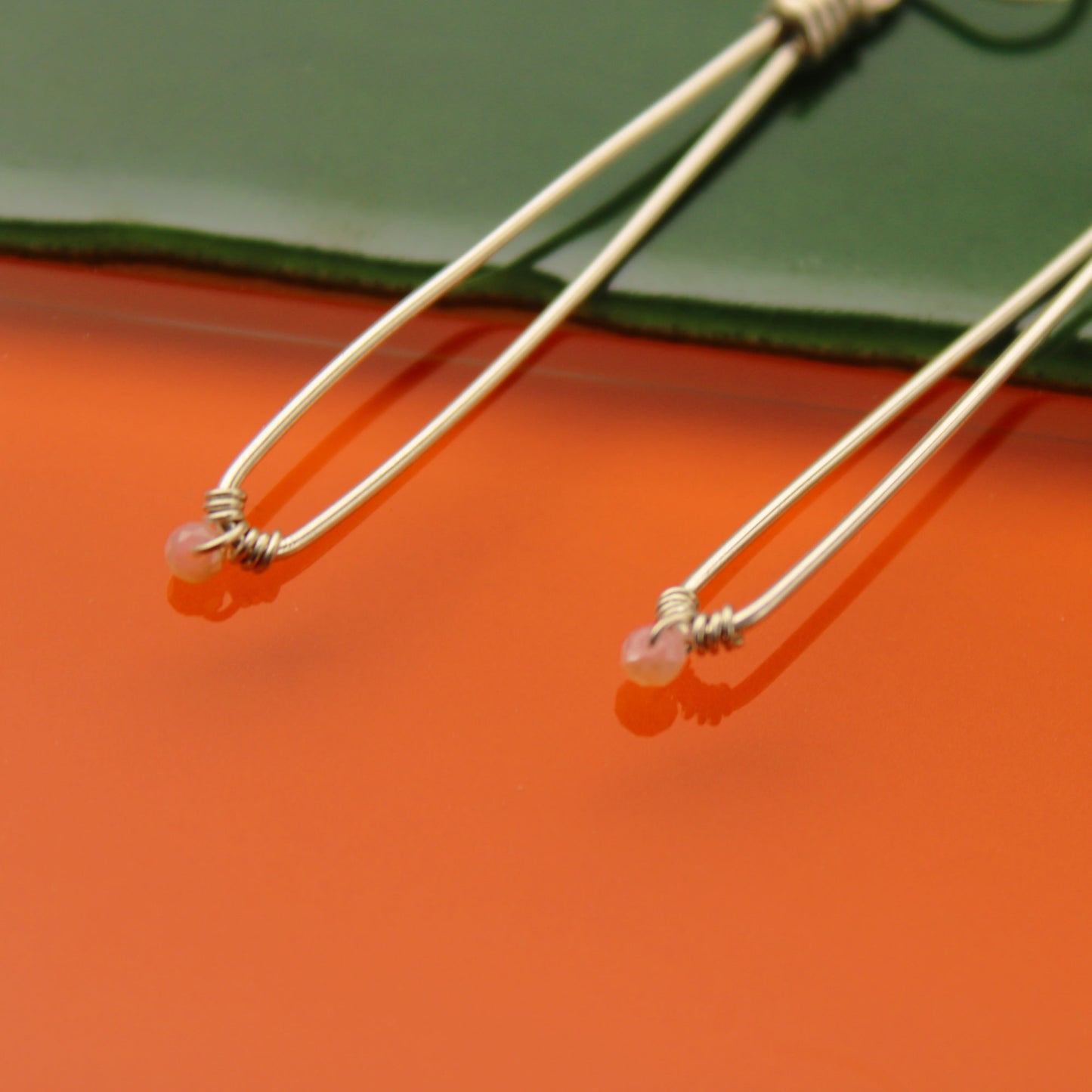 Sleek sterling silver long drop handmade earrings with rose quartz crystal beads carrie foscato design