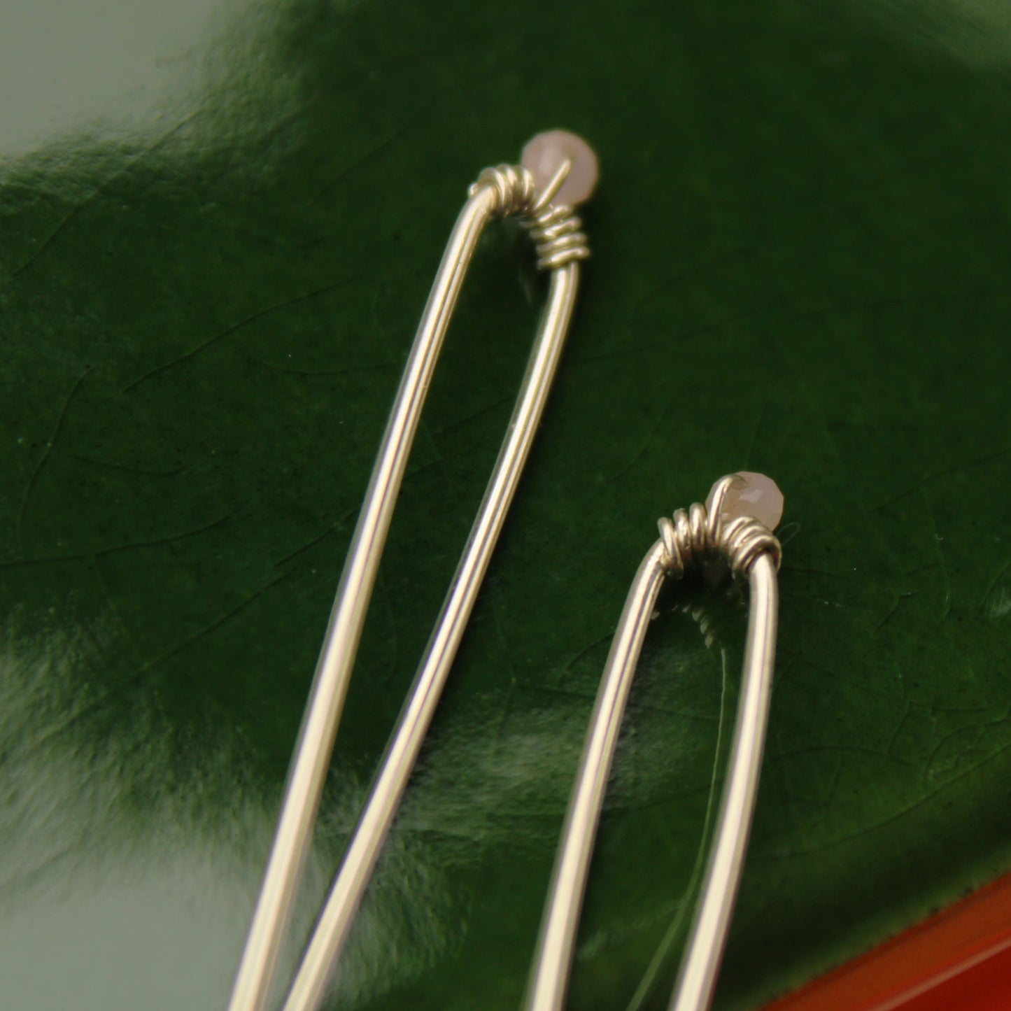 Sleek sterling silver long drop handmade earrings with rose quartz crystal beads carrie foscato design