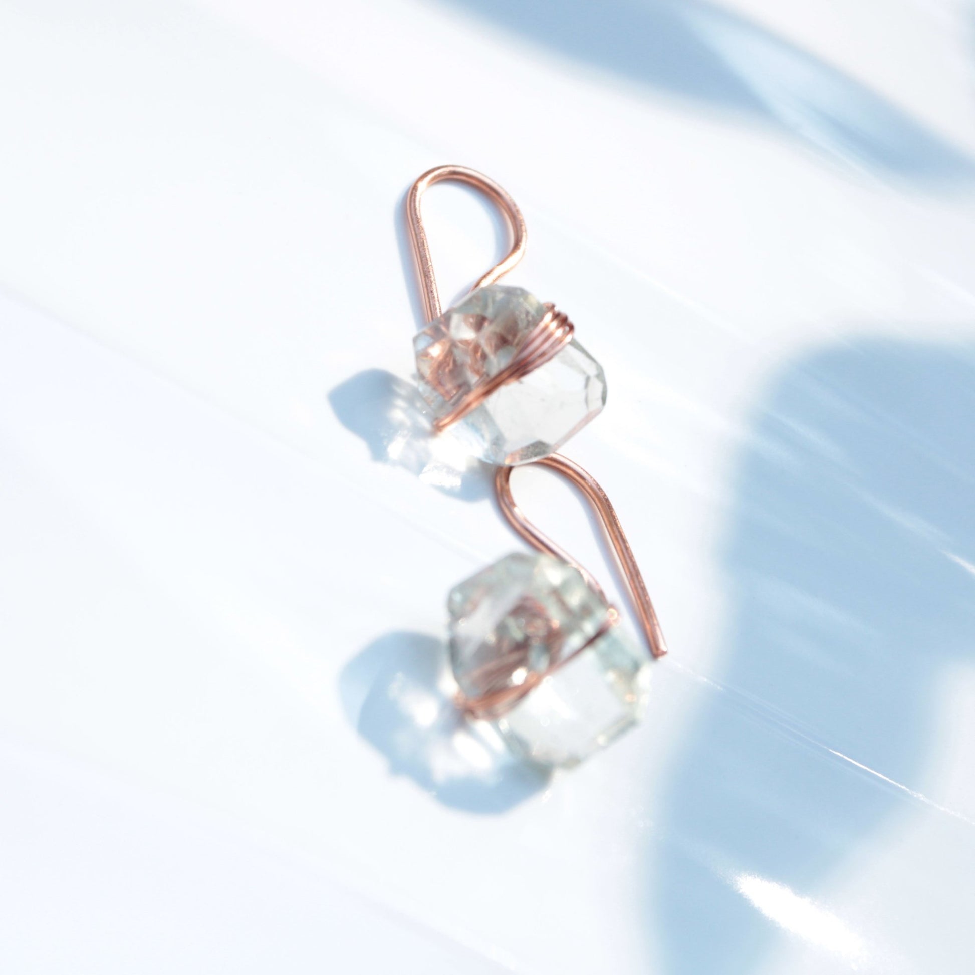 handmade copper wire wrapped earrings with prasiolite chunks. woman-owned Carrie Foscato Design