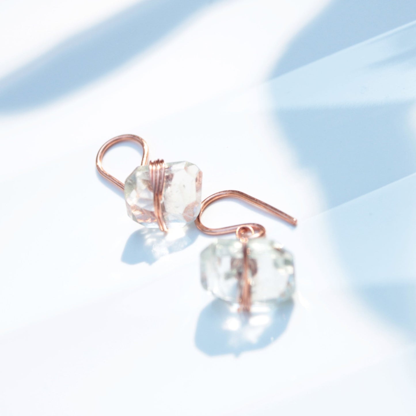 handmade copper wire wrapped earrings with prasiolite chunks. woman-owned Carrie Foscato Design