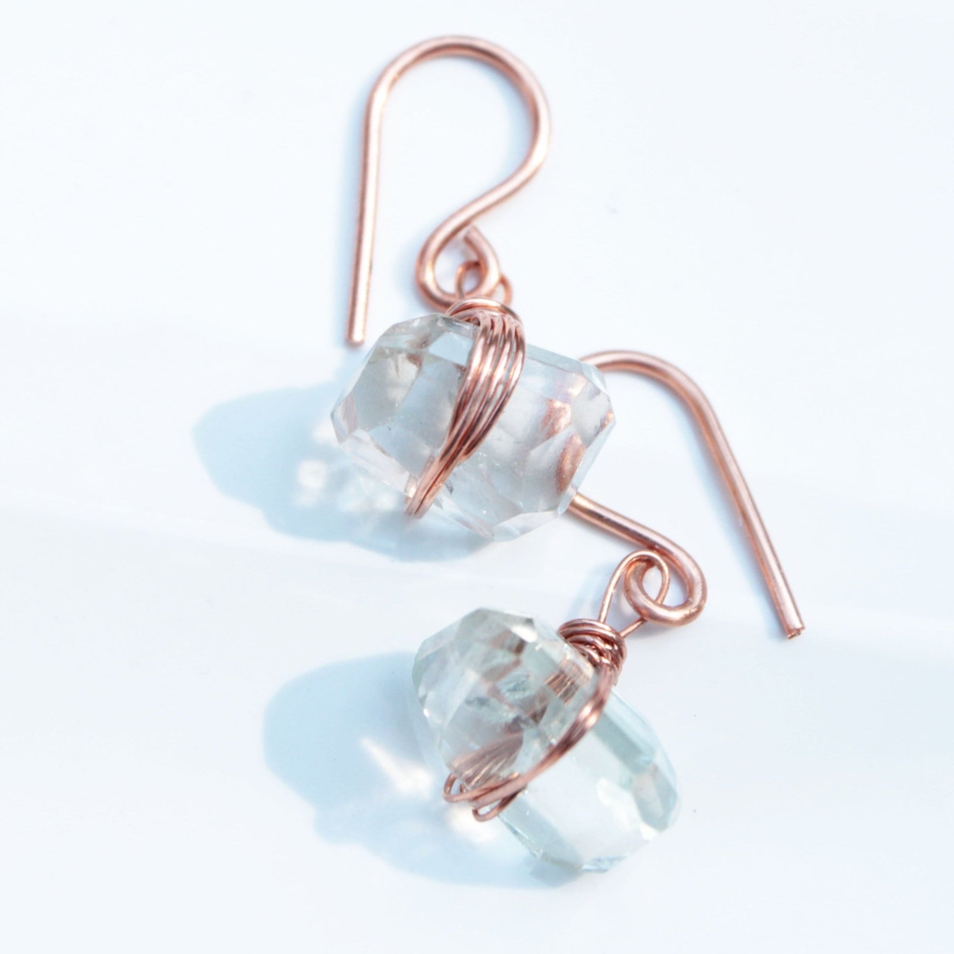 handmade copper wire wrapped earrings with prasiolite chunks. woman-owned Carrie Foscato Design