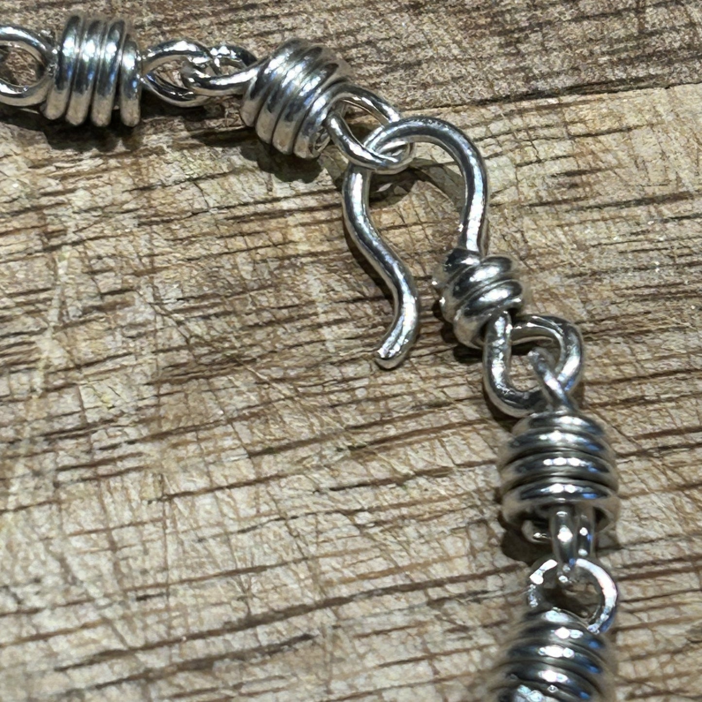 Close up of hook and eye clasp. Sterling silver honey dipper bracelet unisex design by Carrie Foscato design 