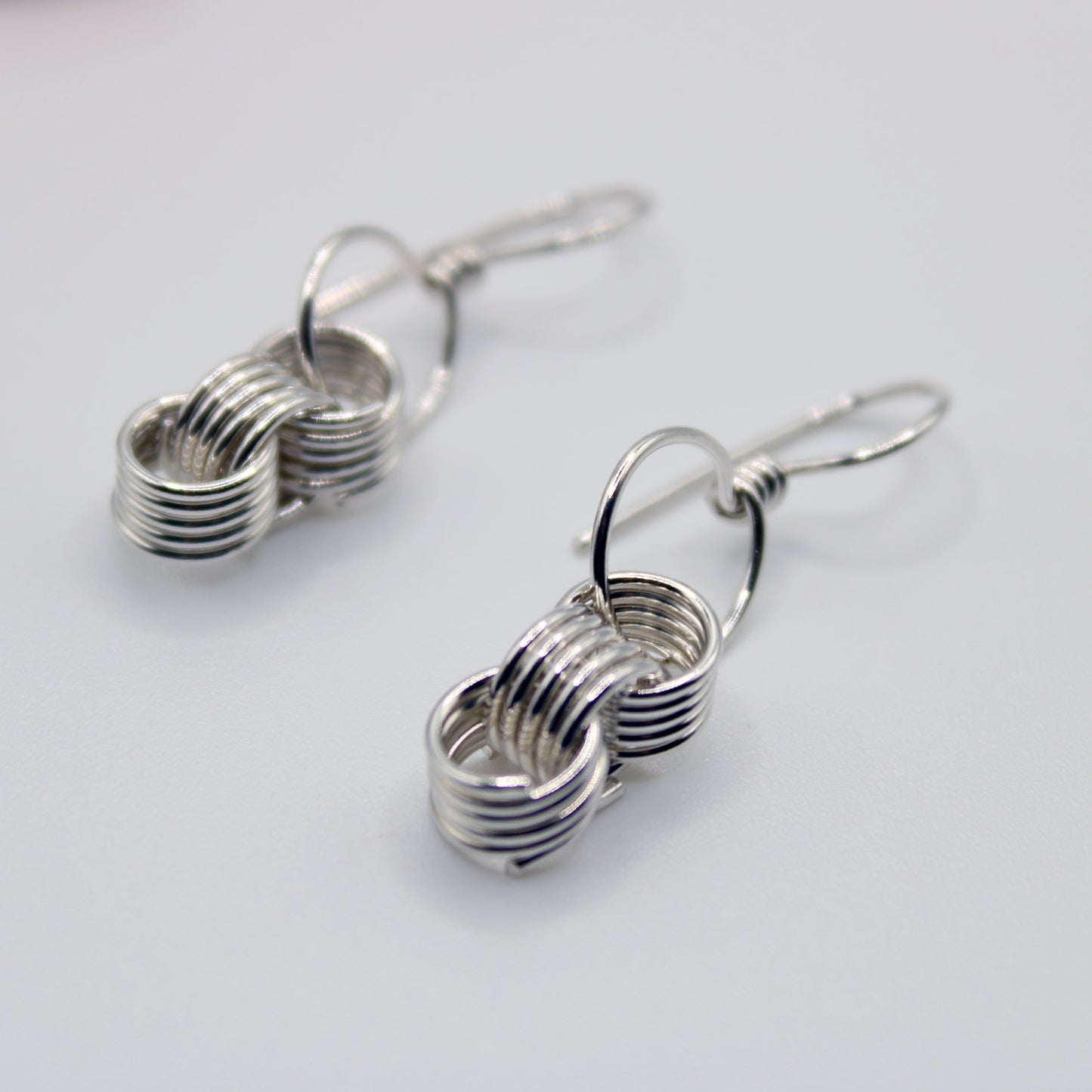 handmade wire wrapped sterling silver triple coiled dangle earrings with french wires