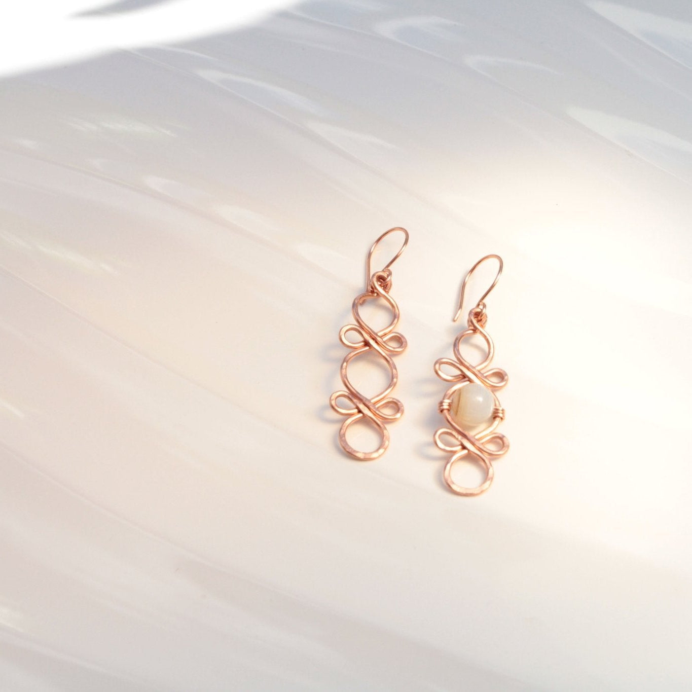 Triple Infinity Looped with custom accent bead handmade french ear wires carrie foscato design USA