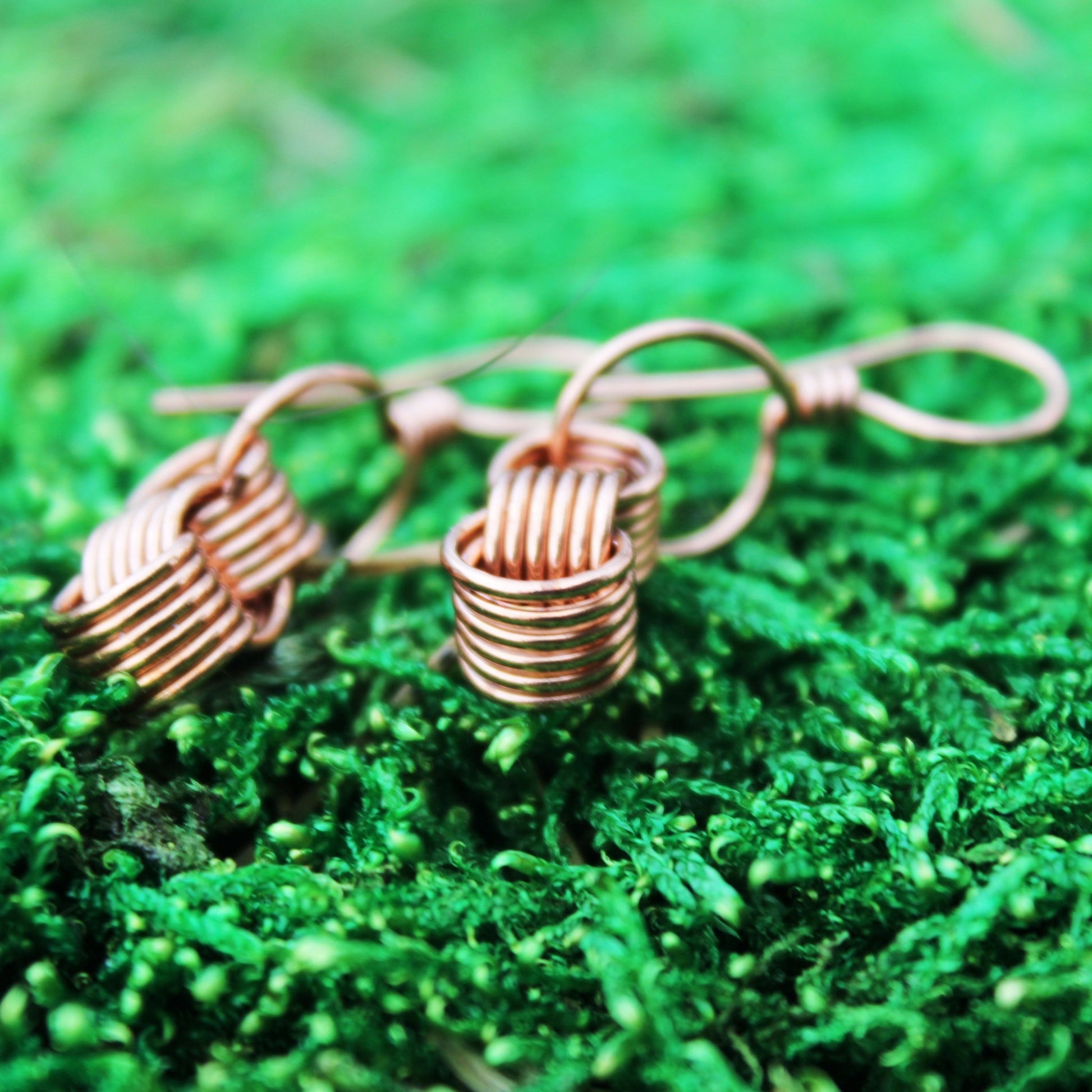 original design of triple coiled wire wrapped earrings handmade by carrie foscato design USA