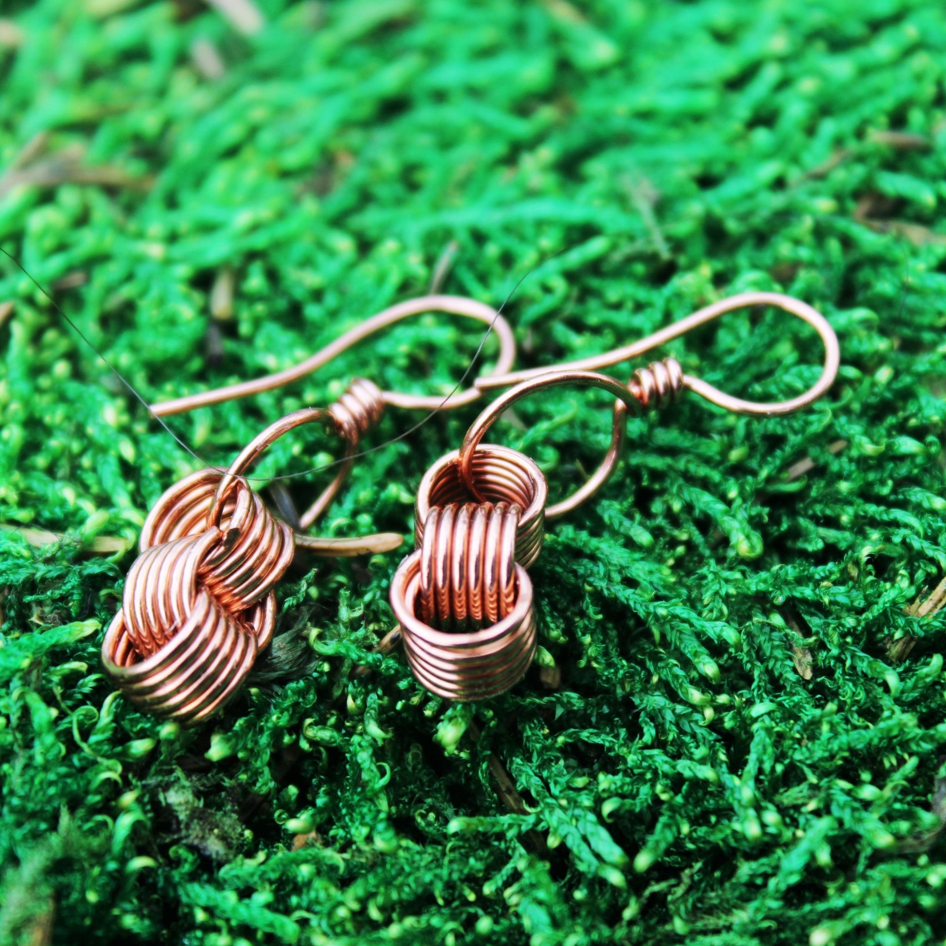 original design of triple coiled wire wrapped earrings handmade by carrie foscato design USA